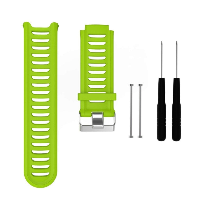 Green silicone watch band with ridged strap and metal clasp, with extra pin tools