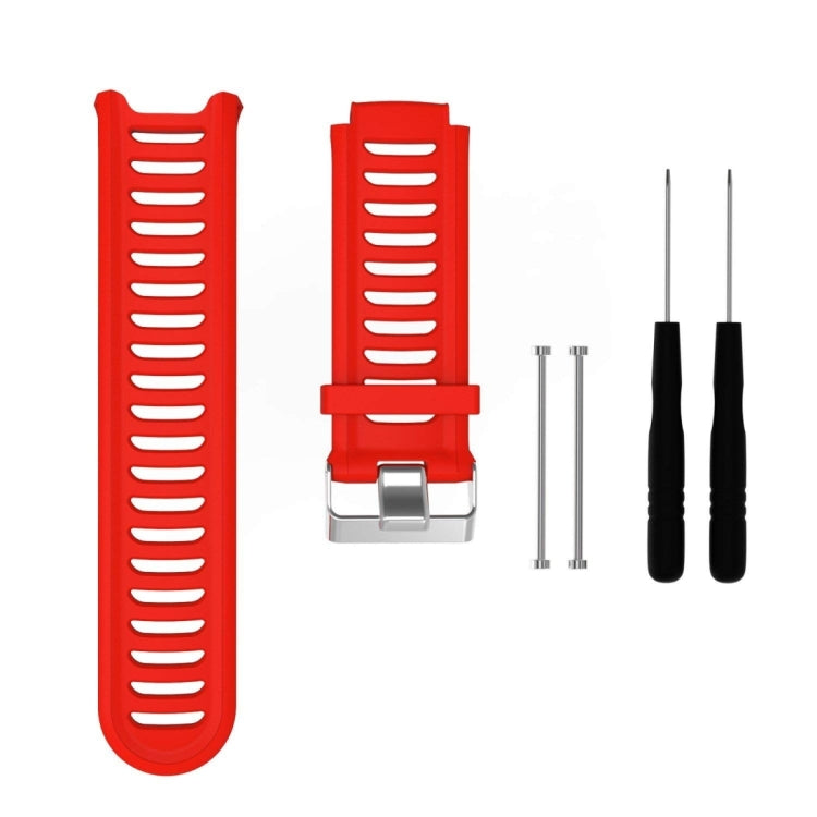 Red silicone watch band with ridged strap and metal clasp, with extra pin tools