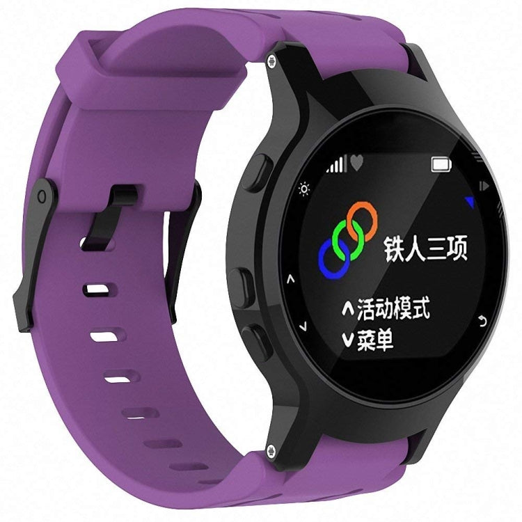 Purple silicone sport watch band with perforated strap and black watch holder.