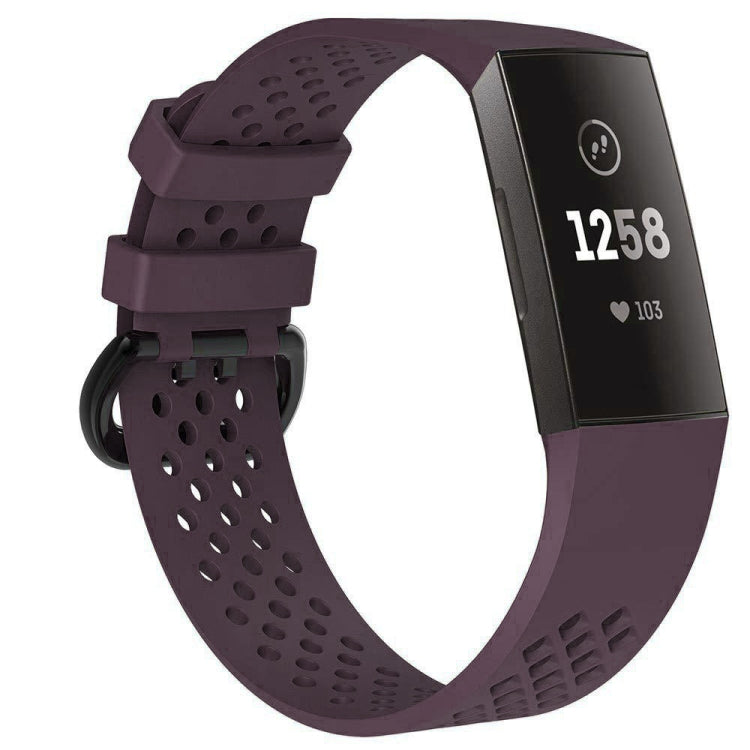 Dark purple perforated sport watch band with adjustable strap and textured clasp area.