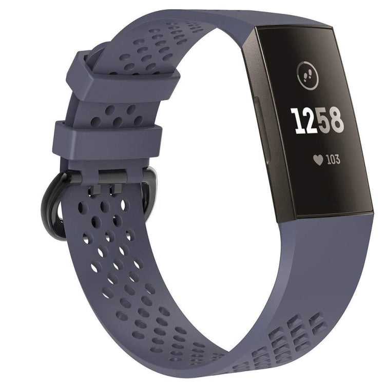 Navy blue perforated sport watch band with adjustable strap and textured clasp area.