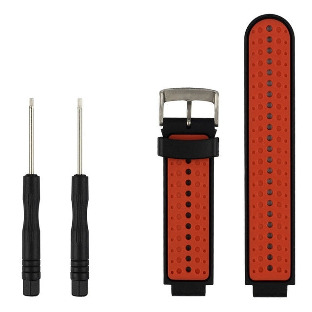 Two-tone silicone sport watch band in orange and black, perforated strap with metal clasp