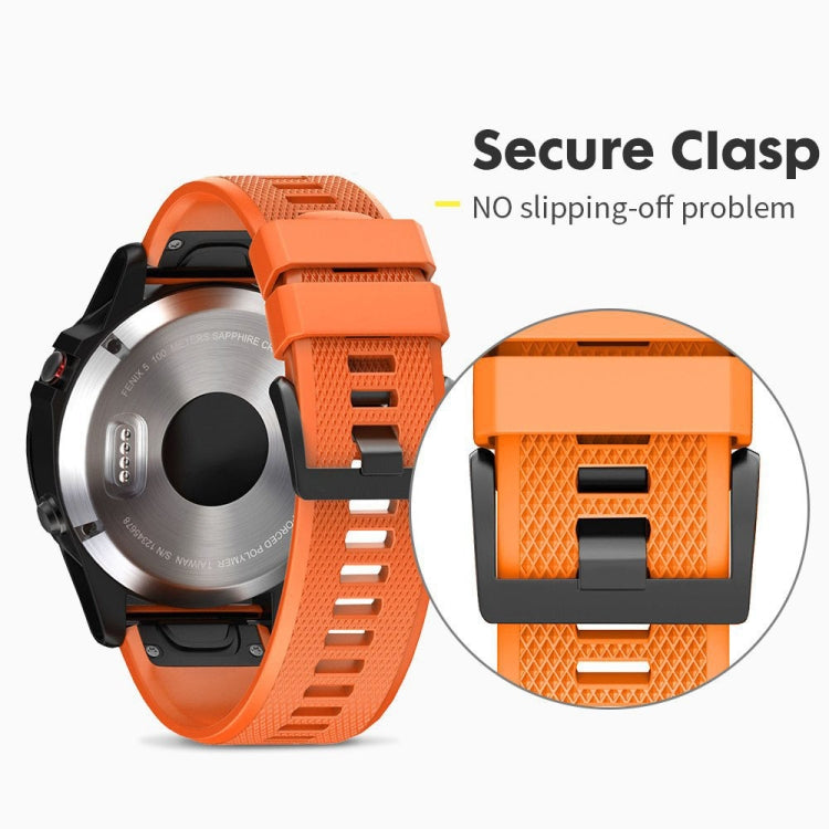 Orange 22mm silicone watch band with clasp buckle and close-up detail