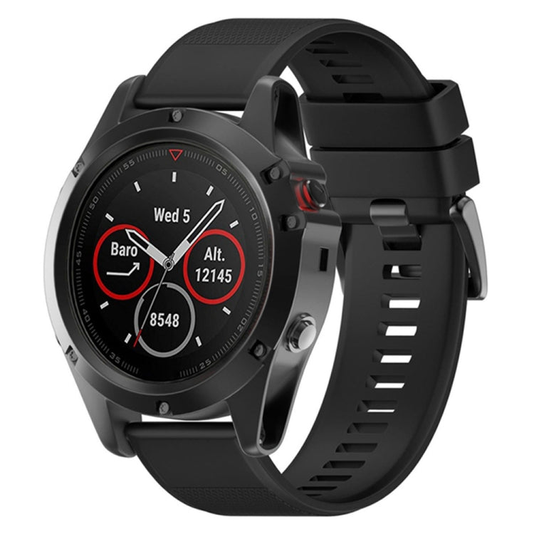Black silicone watch band with textured strap and quick-release clasp