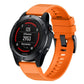 Orange silicone watch band with textured strap and quick-release metal buckle