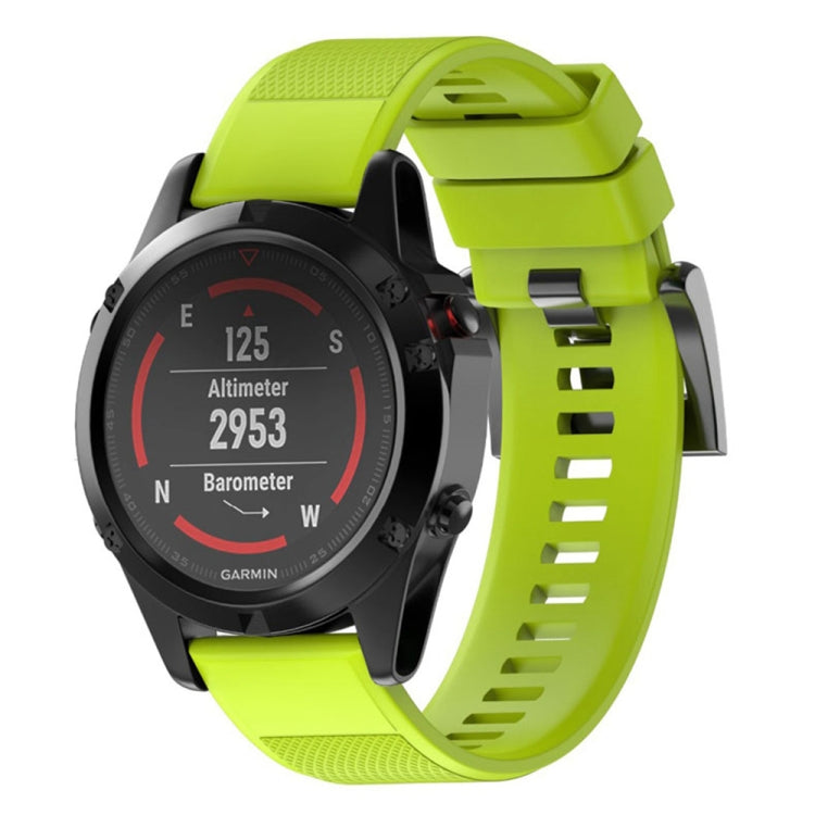 Lime green silicone watch band with textured strap and quick-release metal buckle