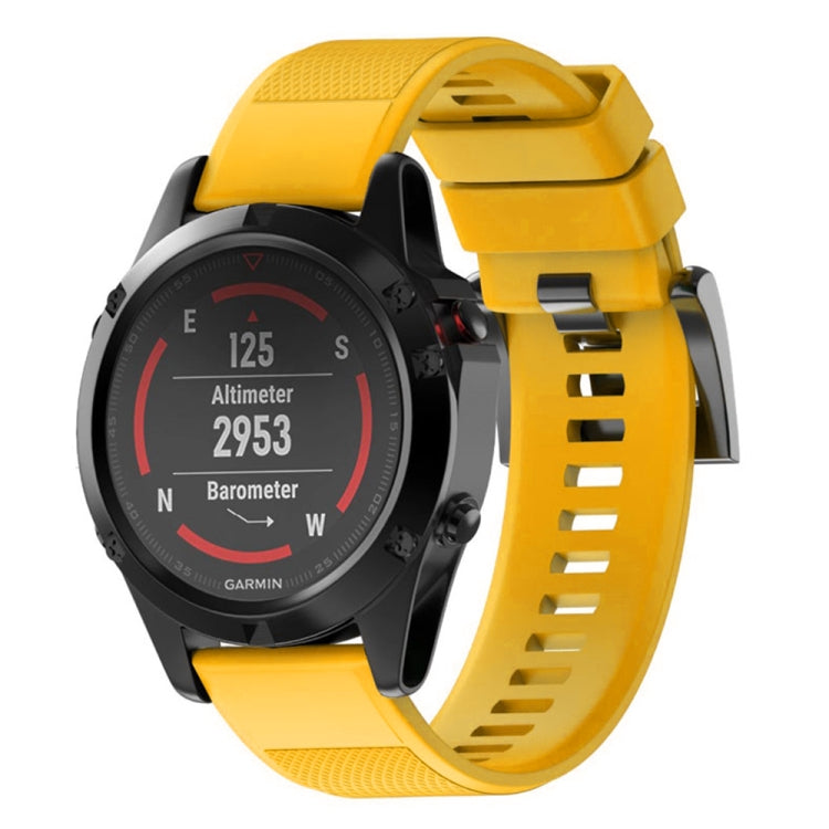 Yellow silicone watch band with textured strap and quick-release metal buckle
