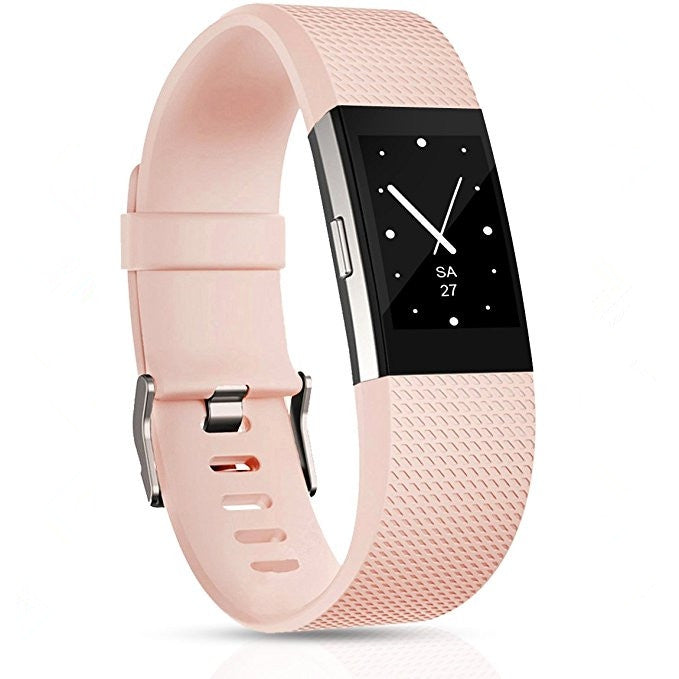 Light pink silicone sport watch band with adjustable holes and silver buckle hardware