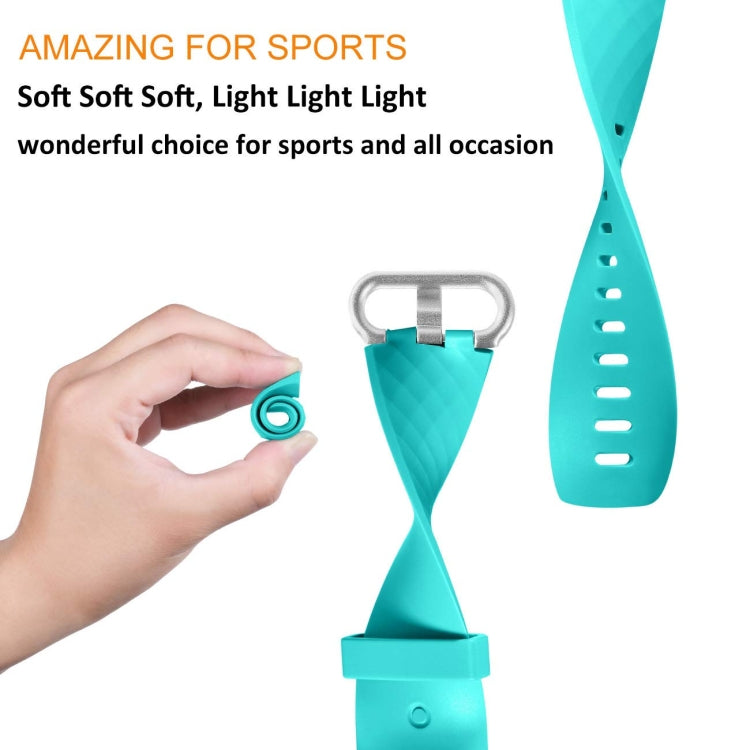 Teal sport watch band with diamond pattern, metal buckle, and adjustable strap holes.