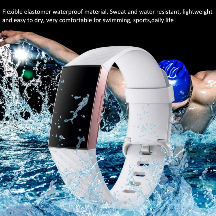 White and dark sport watch bands with textured finish, shown in water splashes.