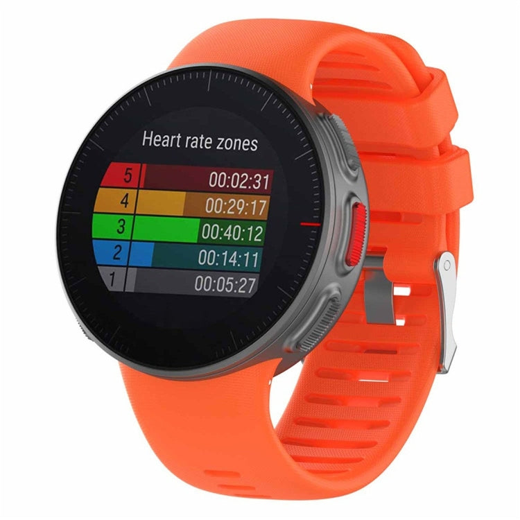 Orange silicone smartwatch band with vented strap and buckle, shown with a dark watch display.