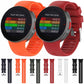 Assorted silicone smartwatch bands in black, orange, red, and white with pin buckles