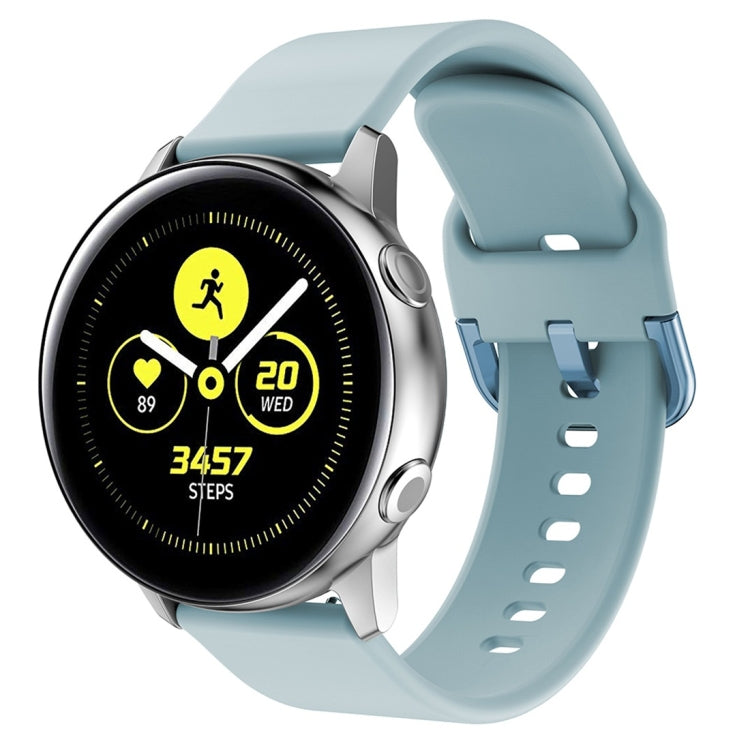 Baby blue silicone watch band with metal buckle and perforated strap holes