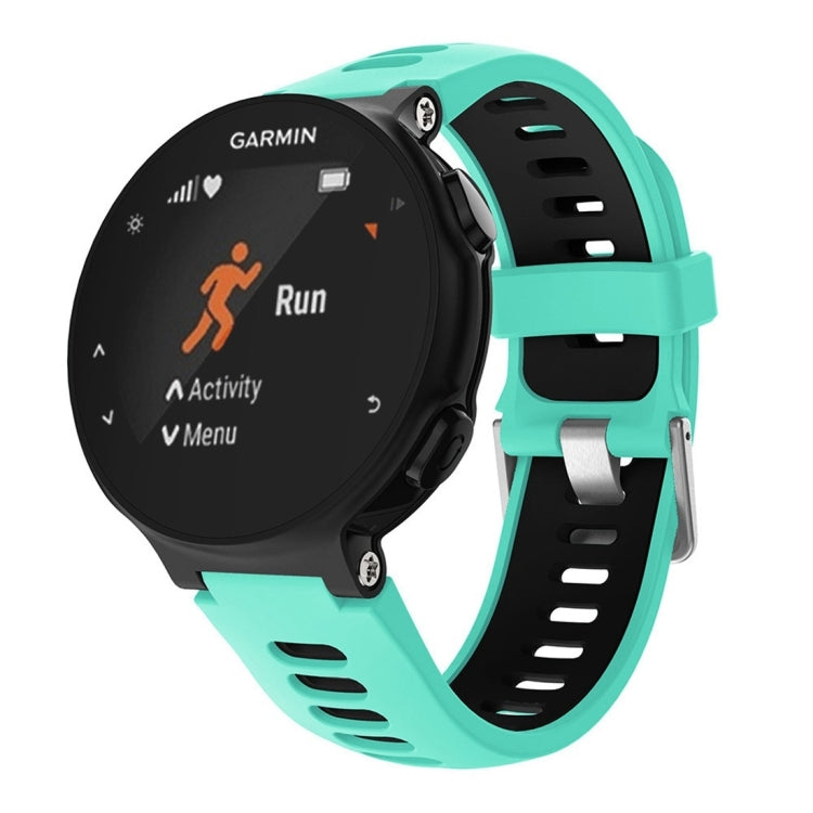 Teal silicone smartwatch band with perforated holes and black watch face