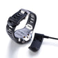 Charging cradle and black cable attached to the Garmin Forerunner 610