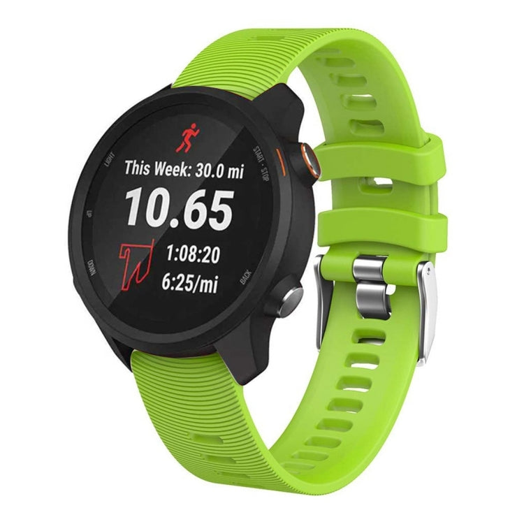 Bright lime green silicone smartwatch band with textured strap and metal clasp