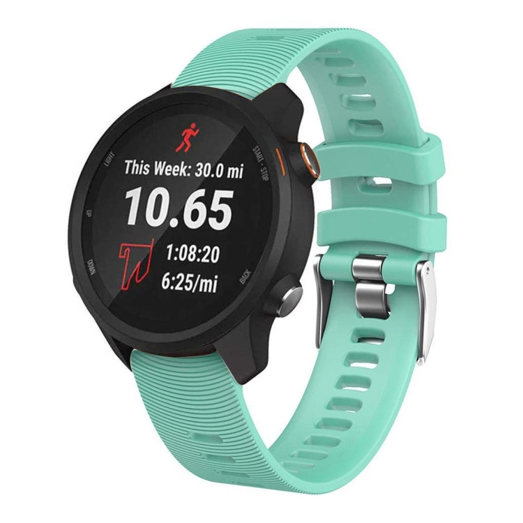 Mint teal silicone smartwatch band with textured strap and metal clasp