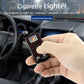 Red cigarette lighter with solar panel and small ignition button, held in hand