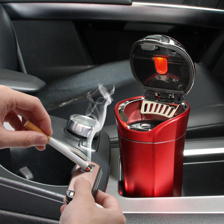 Red car cigarette lighter open with ashtray cover and smoke detail on dashboard