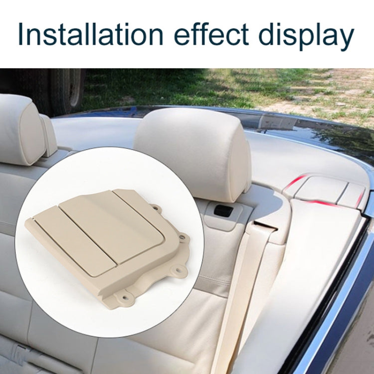 Beige folding rear platform hinge cover installed on convertible interior, left side.