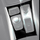 Black gear panel overlay sticker with cutouts around shifter and console buttons