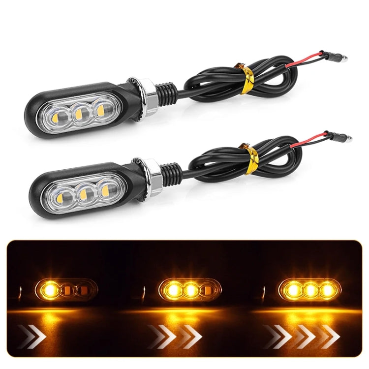 Pair of transparent mini motorcycle water turn signal lights with 3 LEDs and wiring harness
