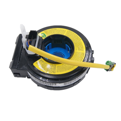 Clock spring spiral cable assembly with yellow ribbon, blue core, black housing, connector