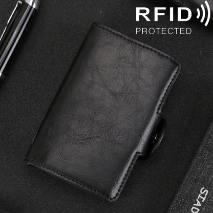Black crazy-horse leather card wallet with stitched edges and front card pocket