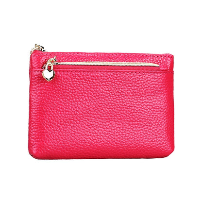 Red litchi-texture women’s zip wallet with heart charm key ring and gold zipper pull