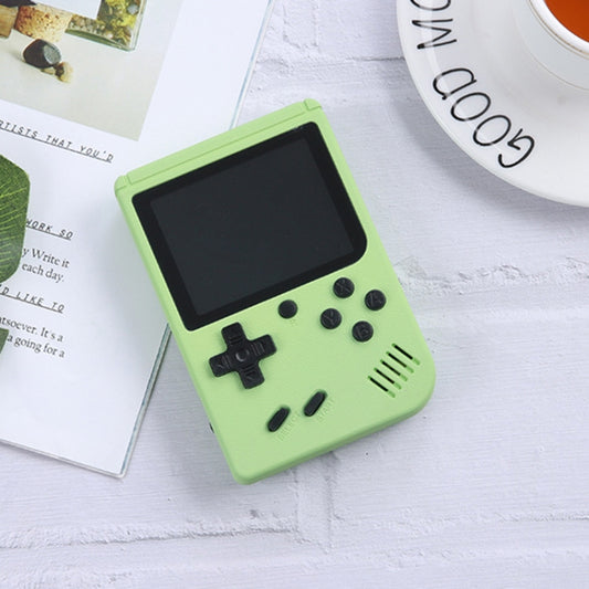 Green MK500 handheld game console with black screen, directional pad, buttons and speaker.