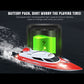 Red and white RC racing yacht with battery pack, water splash near boat