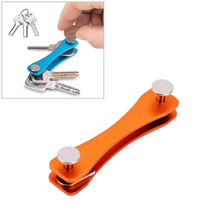 Orange portable metal key storage clip with two round silver end caps