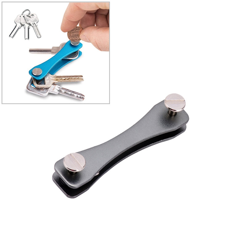 Grey portable metal key storage clip with two round silver end caps