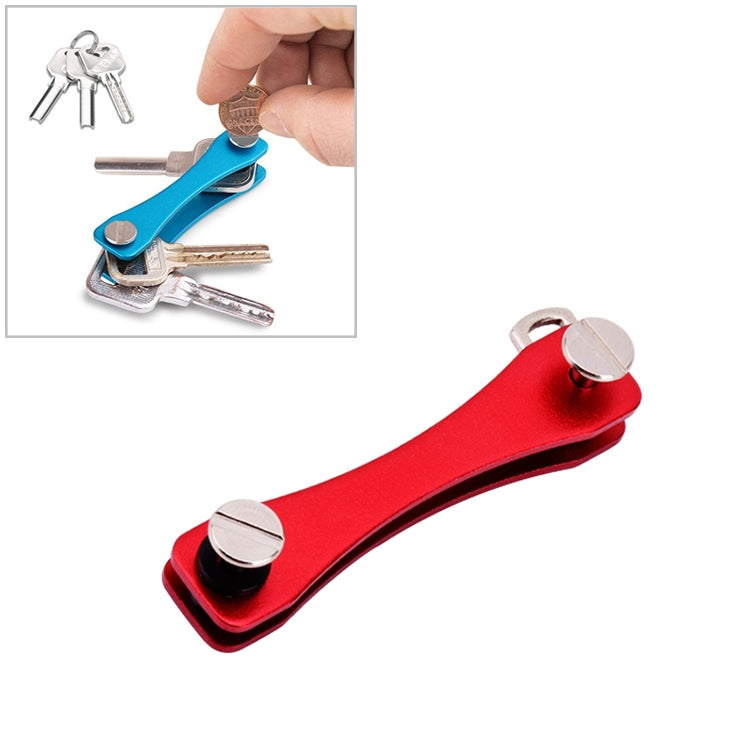 Red portable metal key storage clip with two round silver end caps