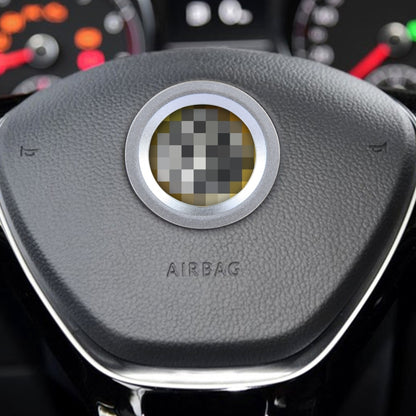 Aluminum steering wheel decoration ring in silver, centered on the airbag hub