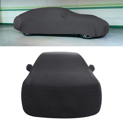 Black hatchback car cover with elastic hem, fitted body shape
