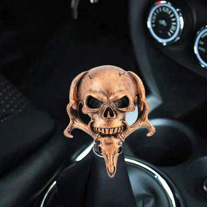 Bronze skull double-head gear shift knob with black mounting sleeve