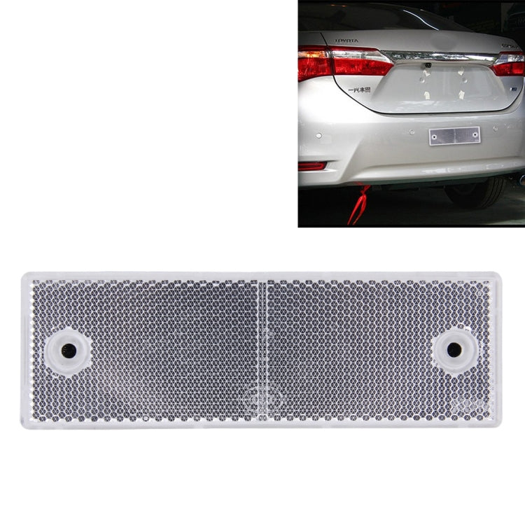 Rectangular rear bumper warning reflector/signal mounted on a car trunk panel