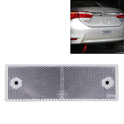 Rectangular rear bumper warning reflector/signal mounted on a car trunk panel
