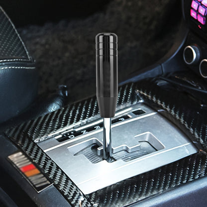 Universal long strip car gear shift knob, black finish with metal base and cap.
