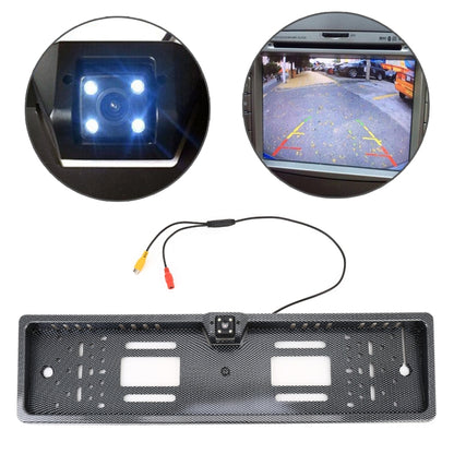Car rear view backup camera with quad LEDs lighting up, black carbon-fiber style housing