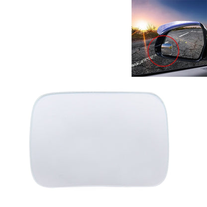 Car blind spot rear view mirror with black housing and wide-angle lens on bracket