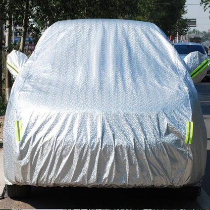 Light gray SUV car cover with green warning strips and elastic hem gathers