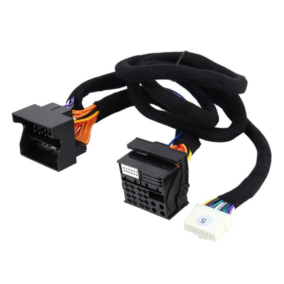 Car stereo wiring harness adapter with black connectors and multi-color cable bundle