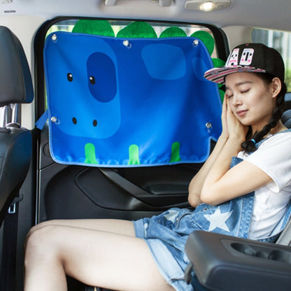 Blue car window sunshade cover with cartoon print and metal eyelets, installed on window