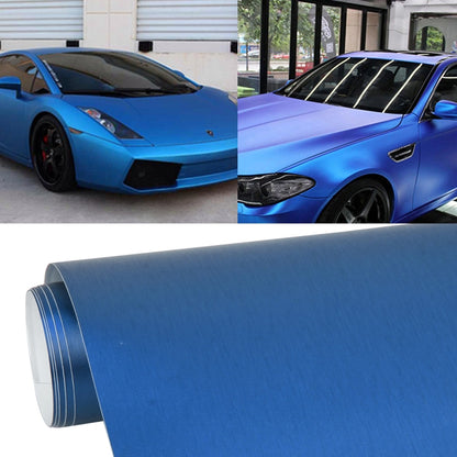Blue brushed-finish vinyl car wrap film shown on a vehicle panel.