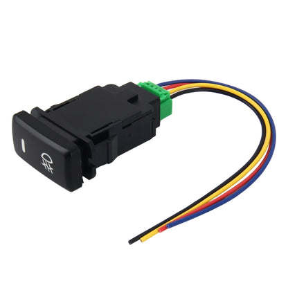 Black fog light switch with green connector and colored wire leads