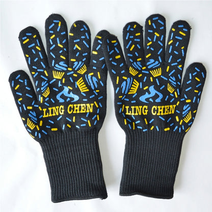 Cotton cooking gloves with dark blue silicone grip and yellow pattern, knit cuff.