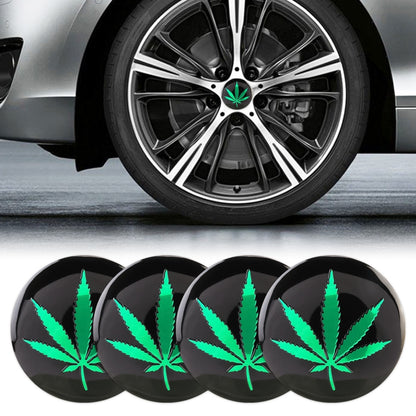 Car wheel hub sticker set: four black discs with bright green leaf designs