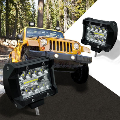 Pair of black LED off-road work lights with square housings and metal mounting studs